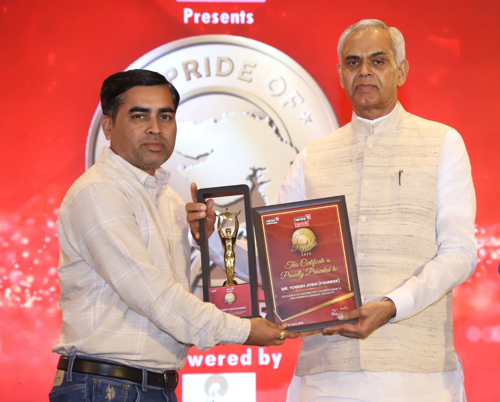 Mr. Yogesh Joshi receiving the Pride of Gujarat Award
